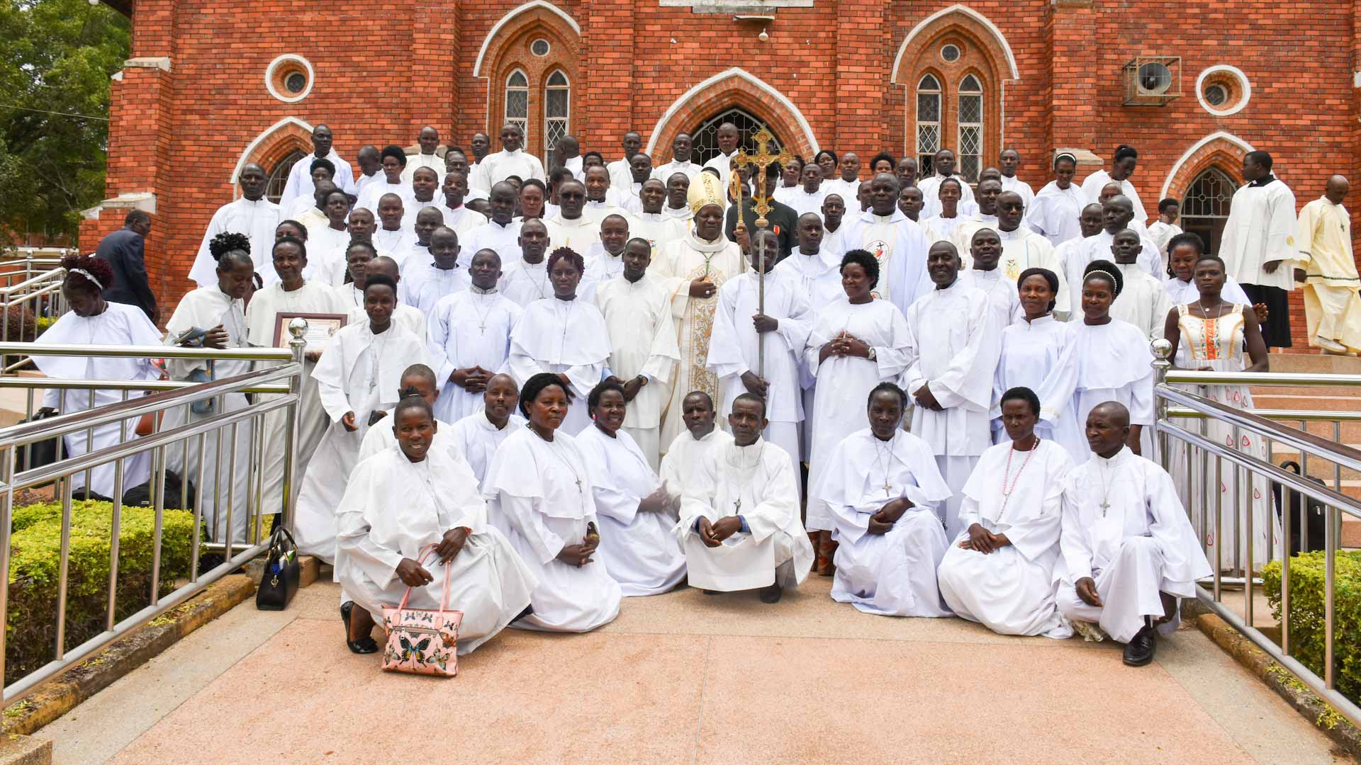 Catechists pose for a group photo with the Bishop