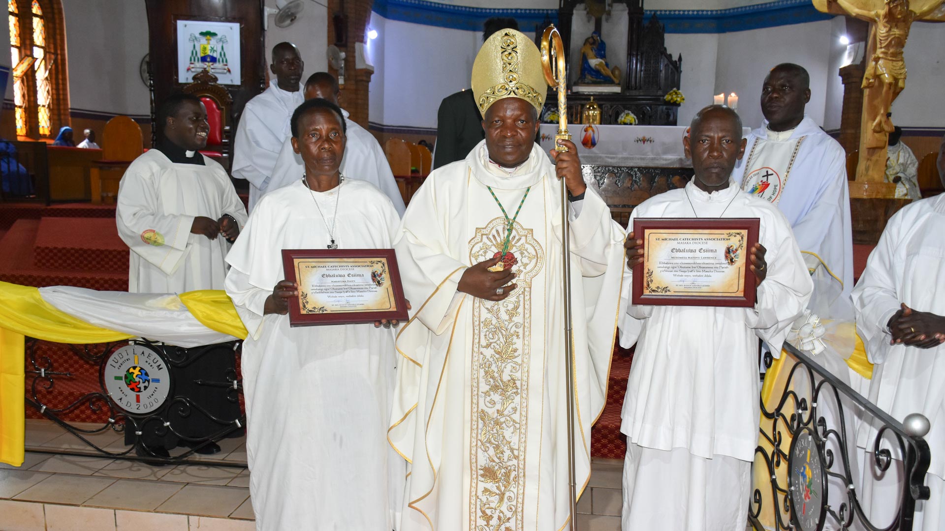 Catechists with Bishop after receiving certificates
